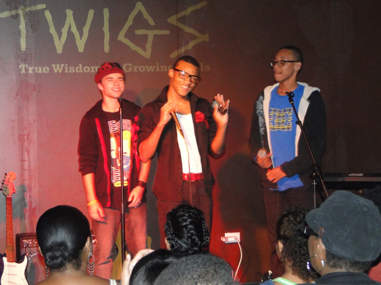 Three young performers sharing the T.W.I.G.S. stage.